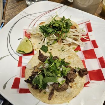 Tuxpan Taqueria signature dishes Carne Asada Tacos, Tacos al Pastor, Gordita, Pollo en Chipotle